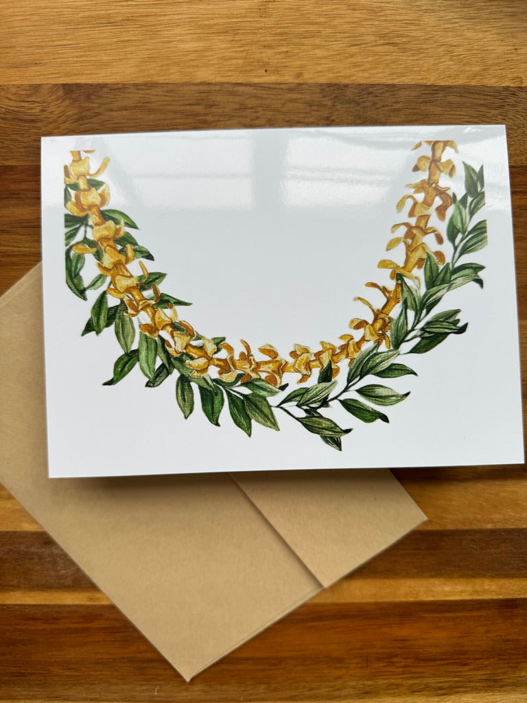 Maile lei and Pua Kenikeni lei strands with white background on a greeting card blank inside.